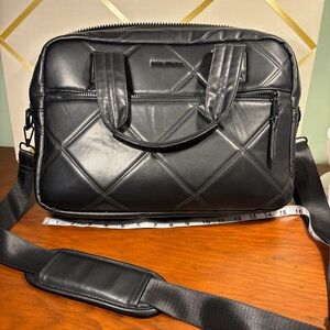Max Studio black laptop travel bag.